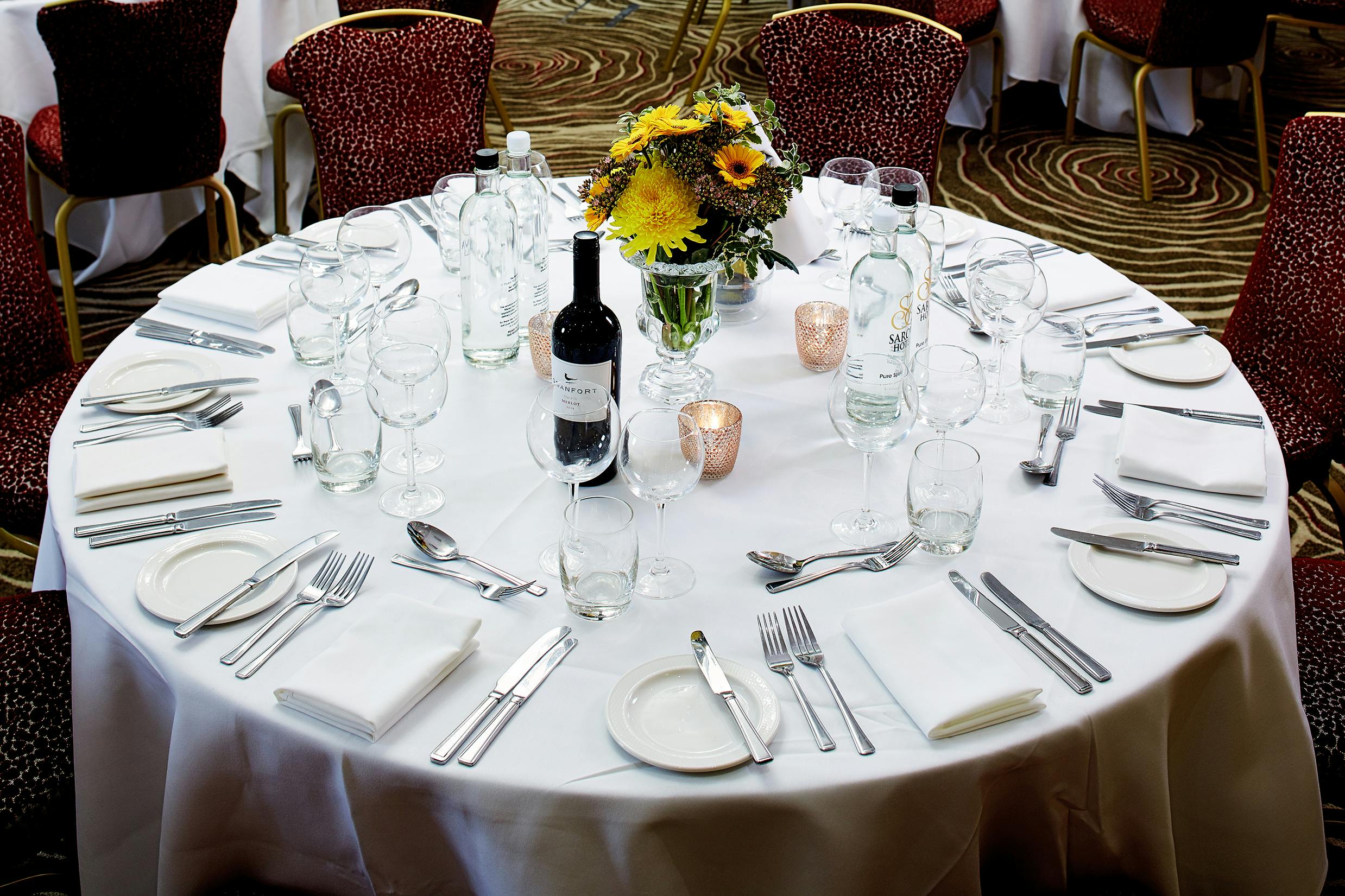 Elegant dining table setup in Elizabeth suite, perfect for formal events and banquets.