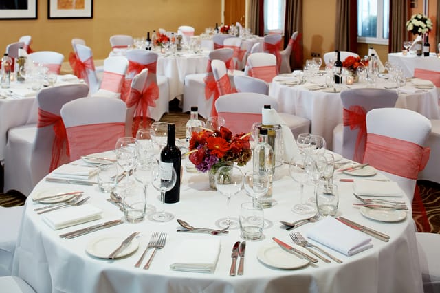 Elegant banquet setup with round tables, ideal for weddings and corporate events.