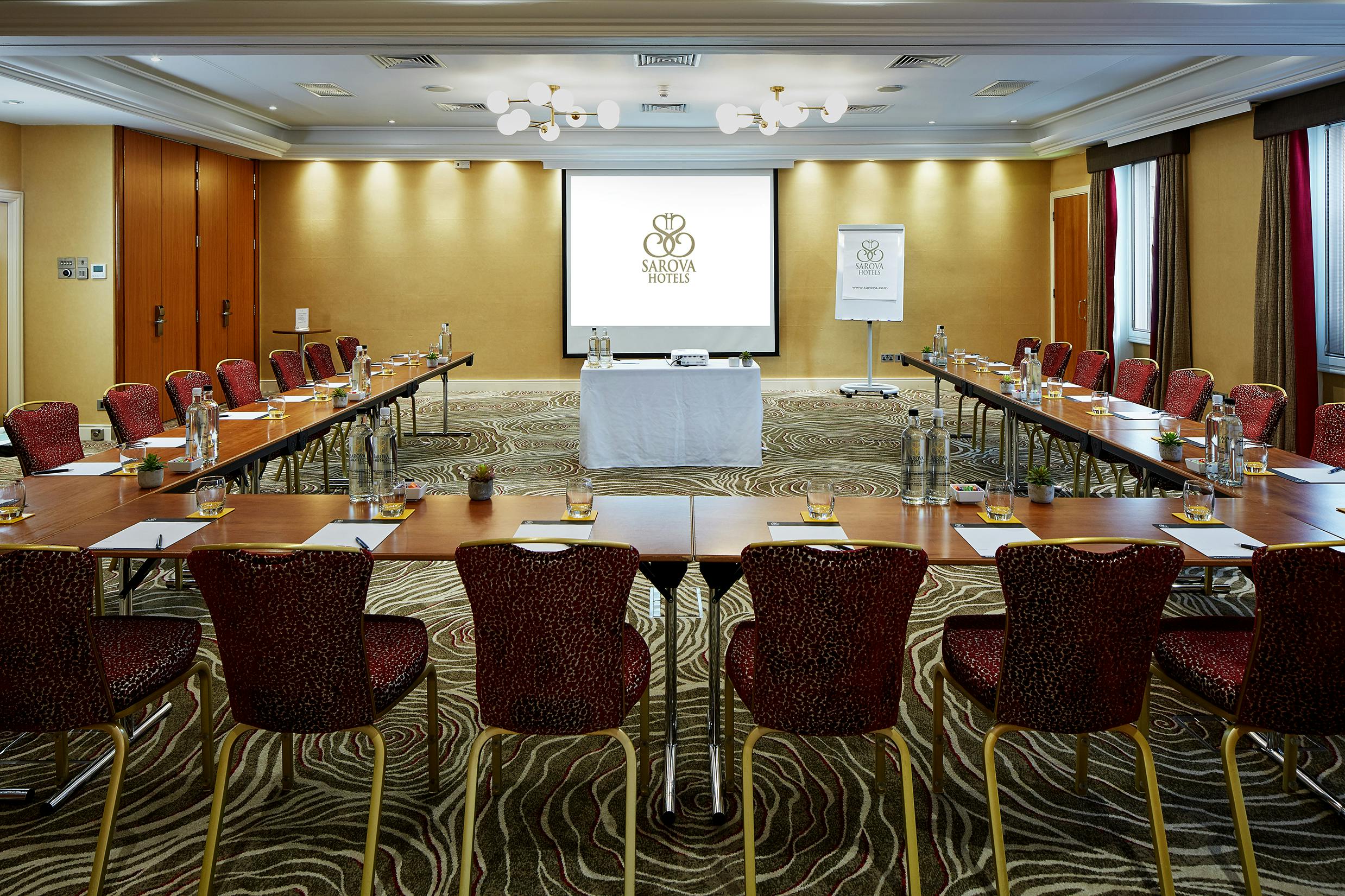 U-shaped meeting room at The Rembrandt, perfect for corporate events and workshops.