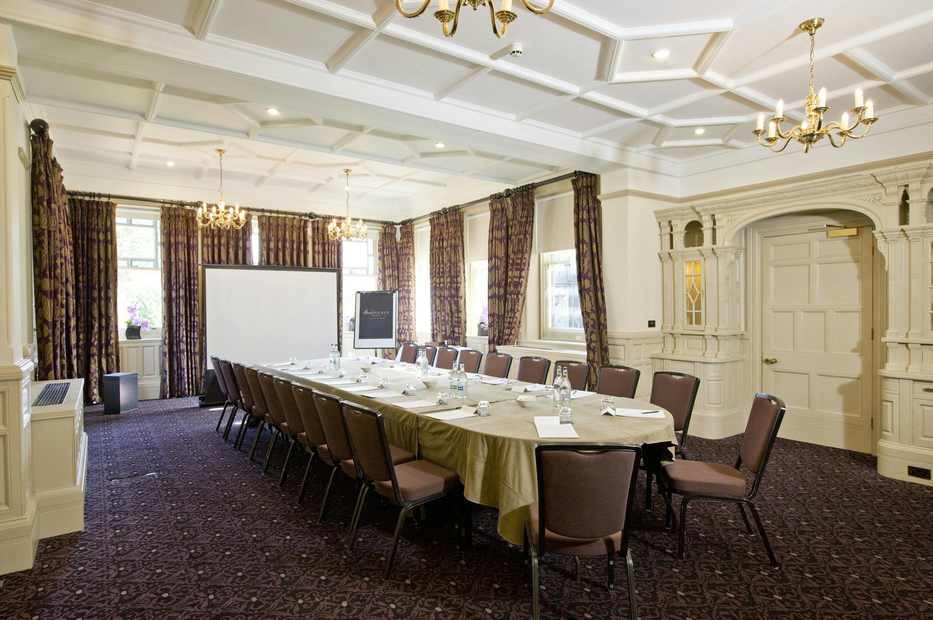 Elegant meeting room at Woodlands Park Hotel, perfect for professional events and discussions.