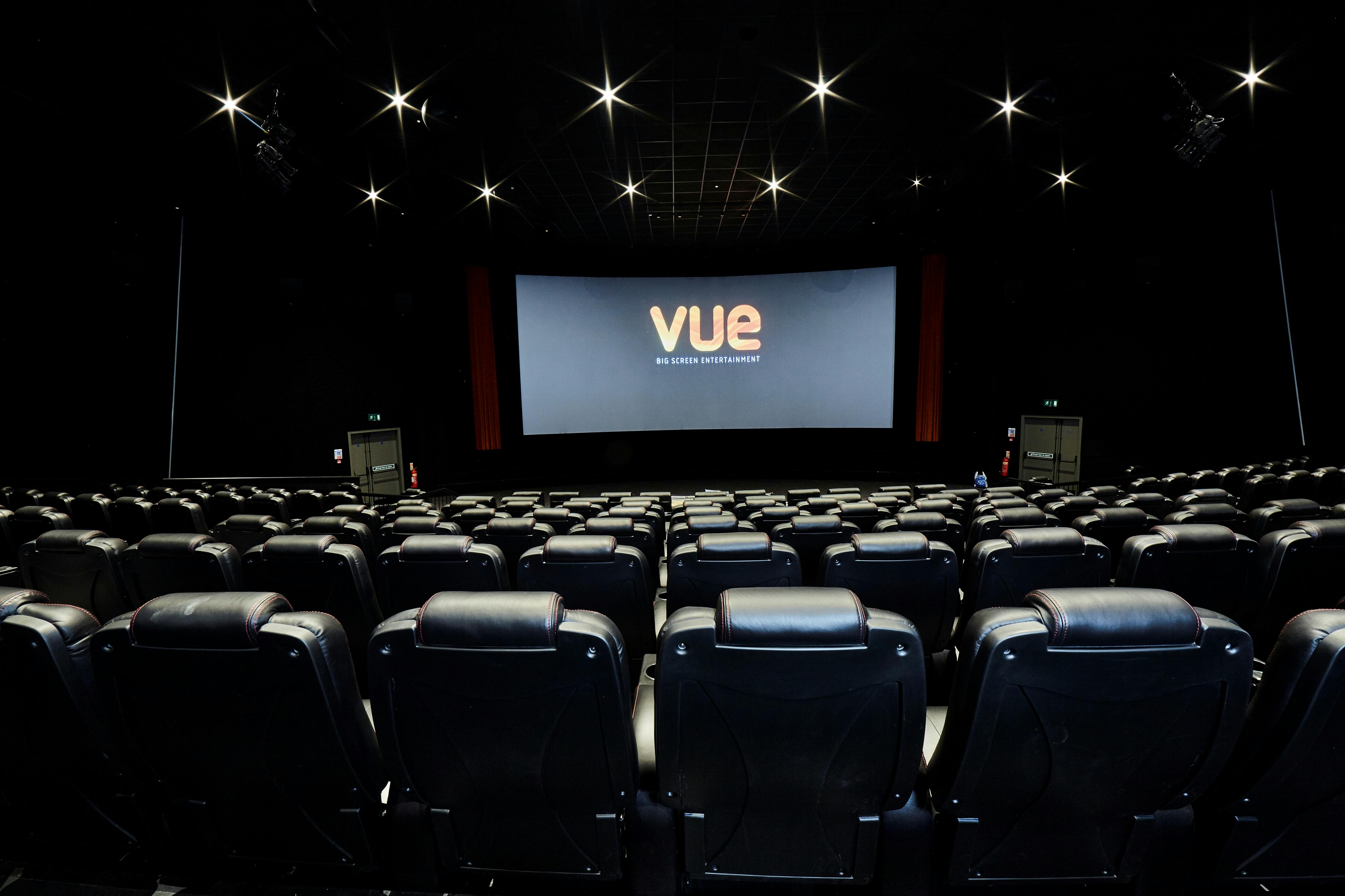 Modern cinema auditorium with spacious seating for film screenings and corporate events.