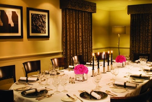 Elegant dining table at Wharfedale, perfect for intimate dinners and corporate events.