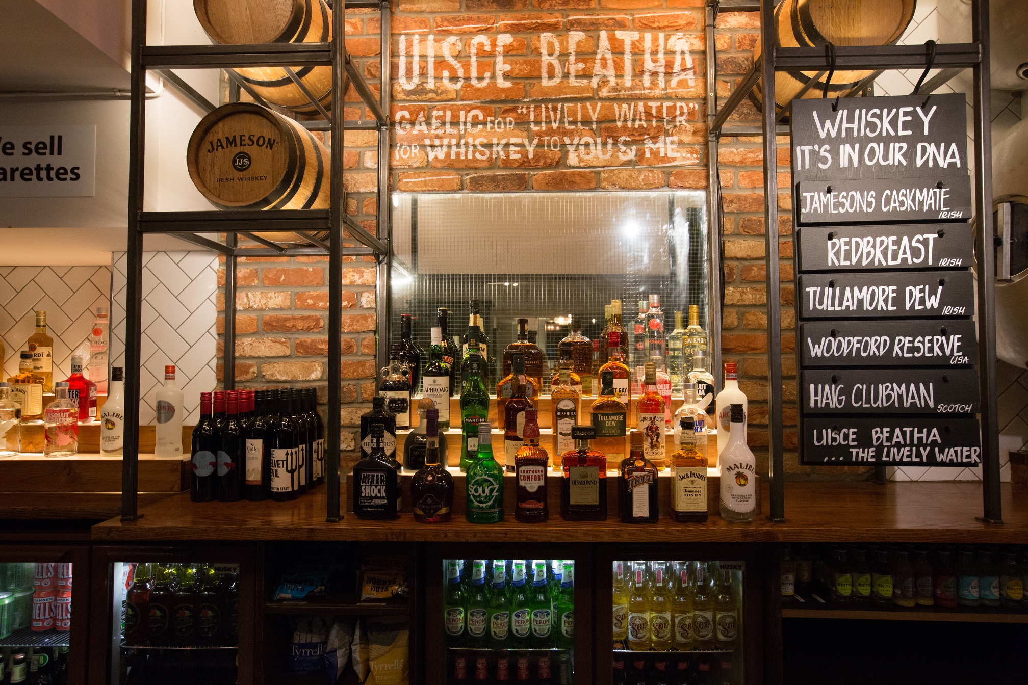 Ground Floor bar at O'Neill's Wardour Street, featuring whiskey selection for events. - Banner
