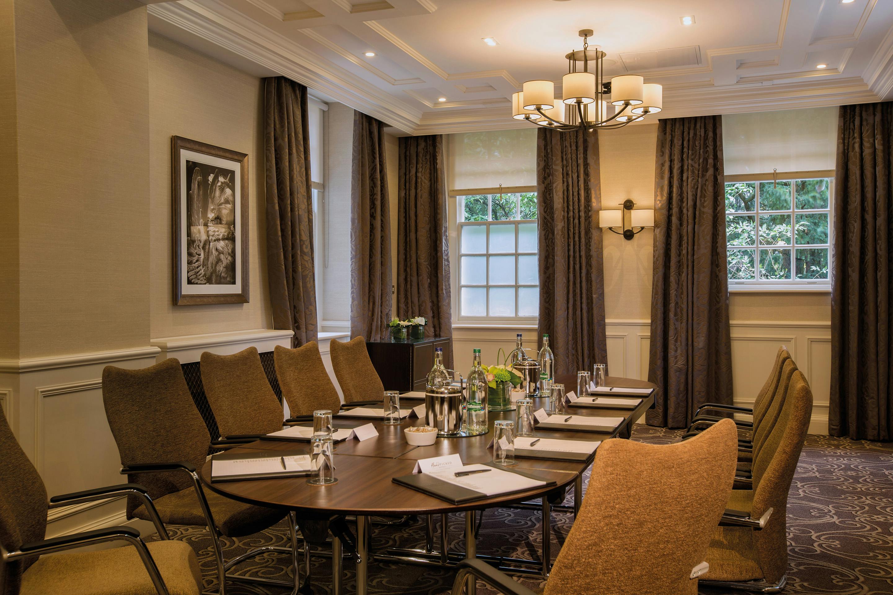 Meeting room at Crathorne Hall Hotel, Yorkshire, with round table for professional gatherings.