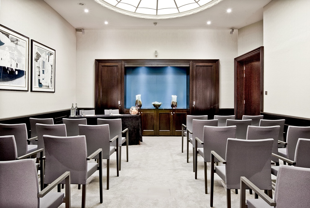 Elegant meeting room at Threadneedles Hotel, London for conferences and gatherings. - Banner