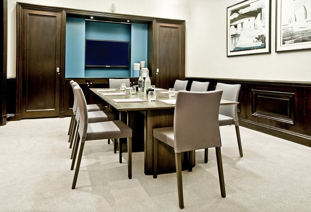 Modern meeting room at Threadneedles Hotel, London, ideal for professional gatherings.