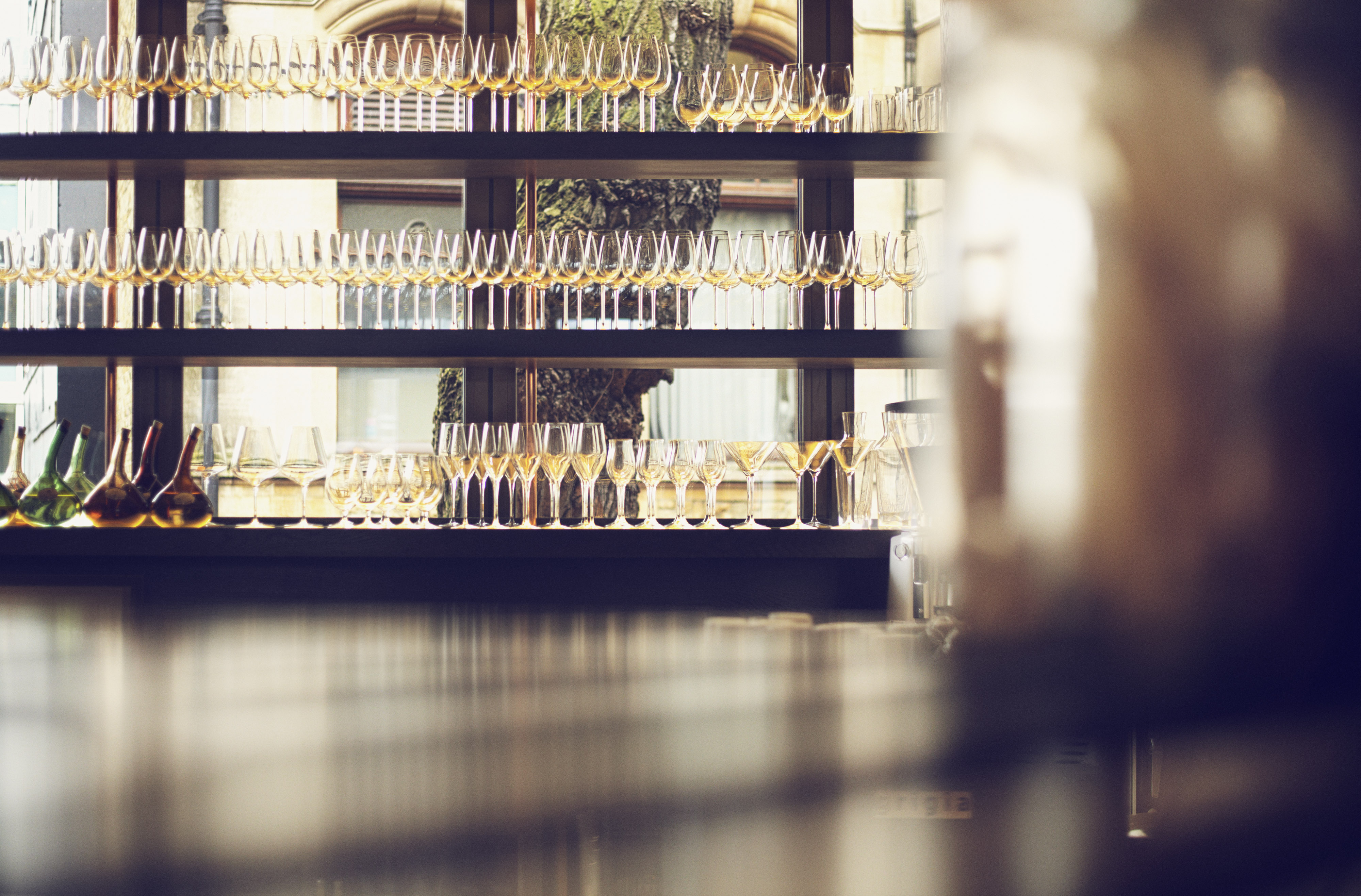 Elegant glassware display for Private Hire at Restaurant Story, perfect for cocktail receptions. - Banner