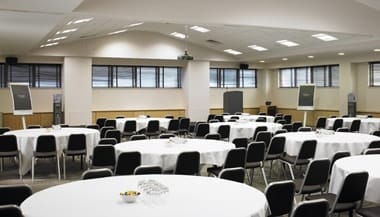 Oxford and Cambridge room banquet setup for corporate galas and plenary sessions.