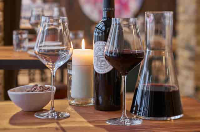 Elegant private dining room with fine wine for networking events and upscale dinners.