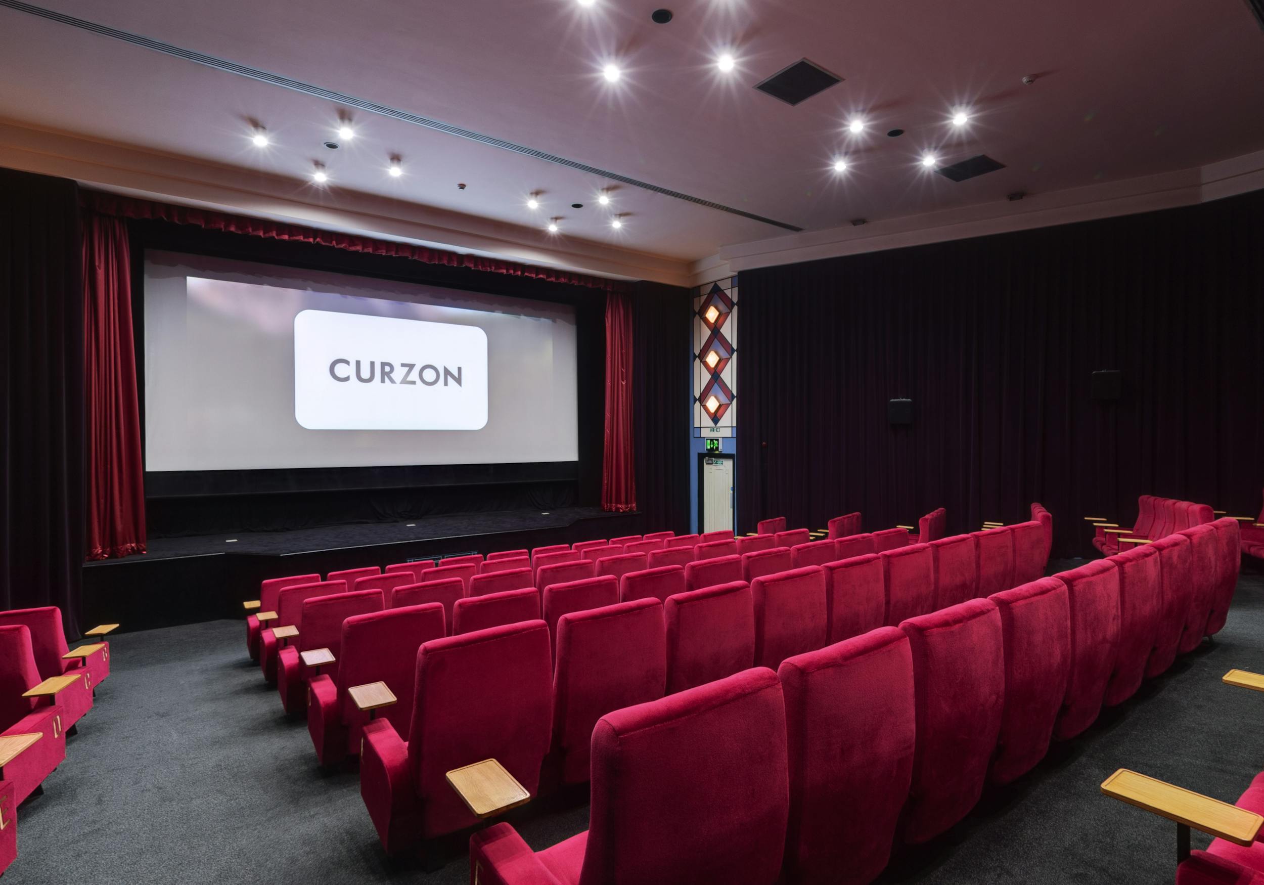 Curzon Knutsford cinema with plush red seating for film screenings and private events.