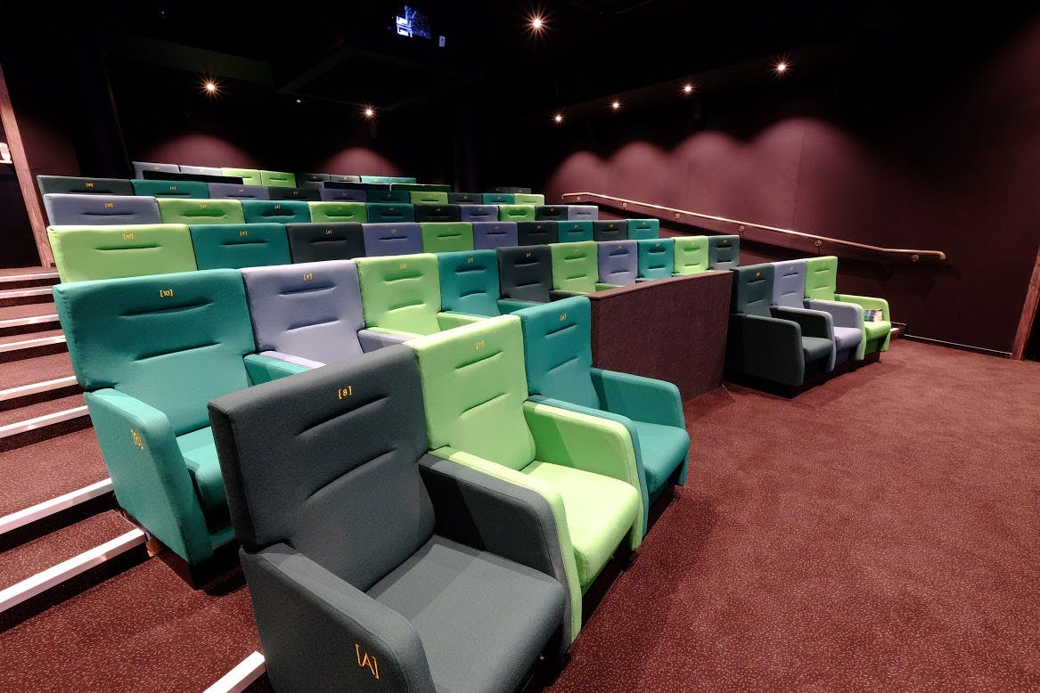 Modern auditorium with tiered seating in Curzon Sheffield, ideal for conferences and screenings.