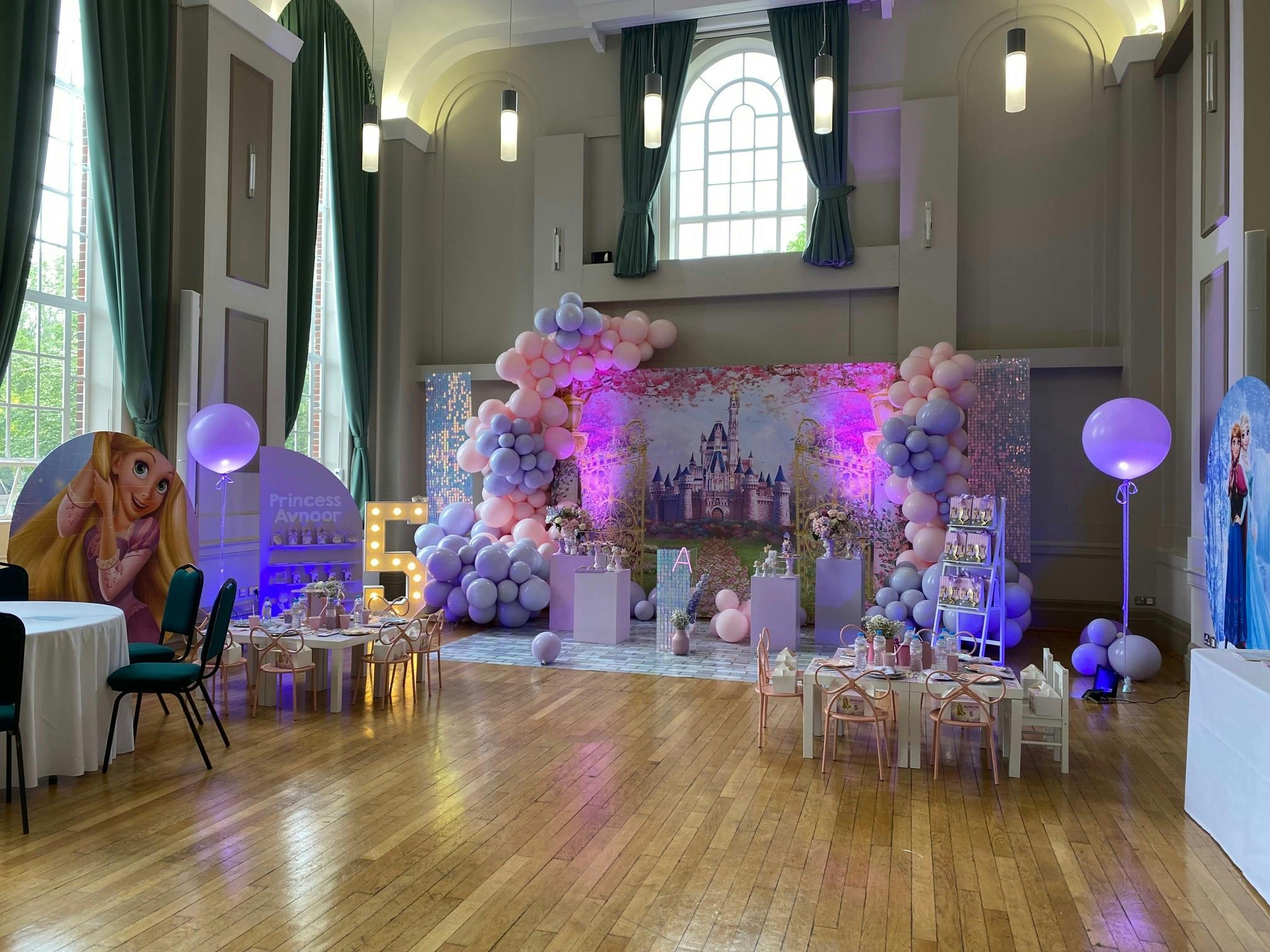 Herringham Hall children's party venue with pastel balloons and fairytale decor.