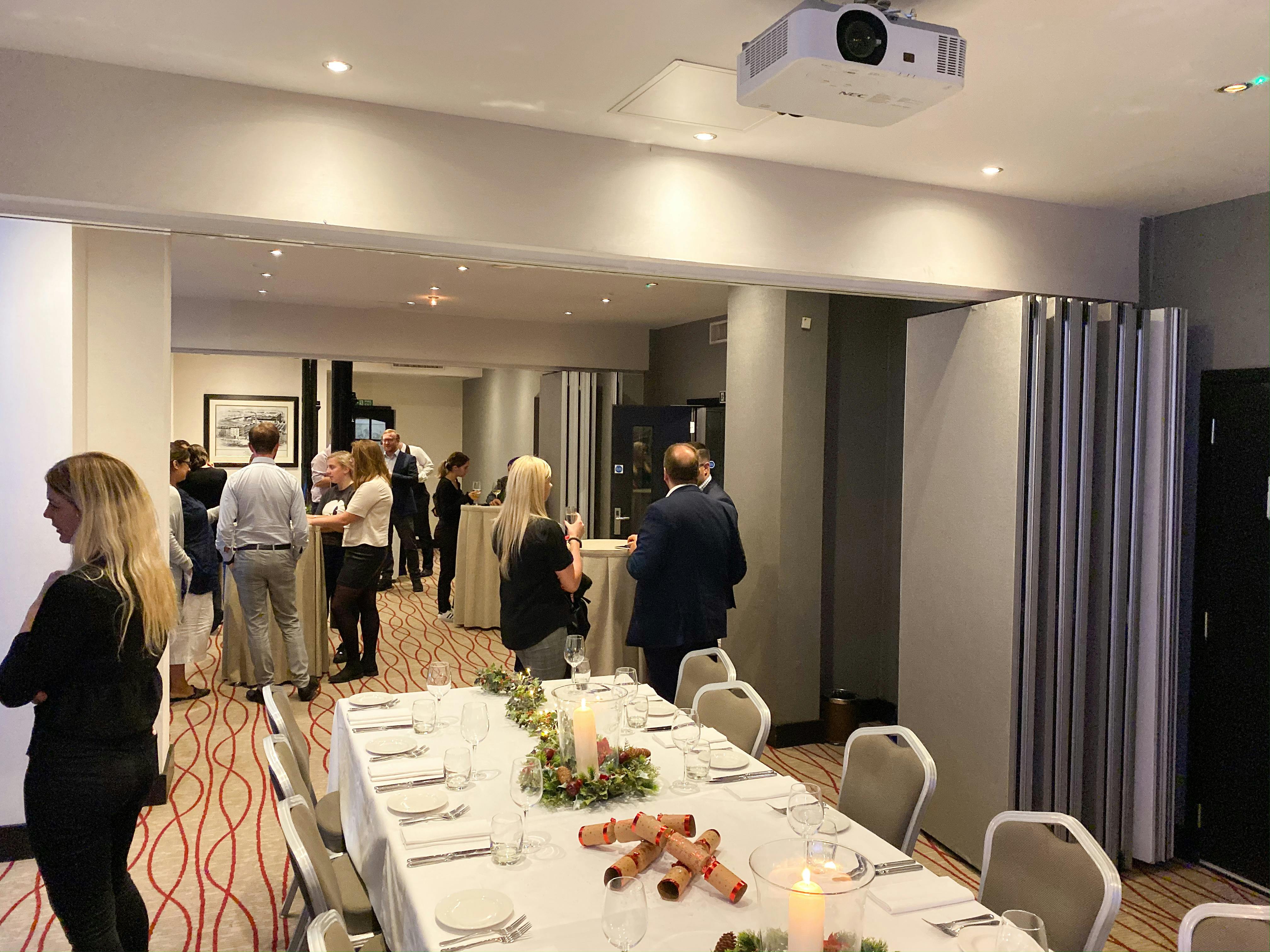 Elegant dining setup in Samuel Room for networking event at Chiswell Street Dining Rooms.