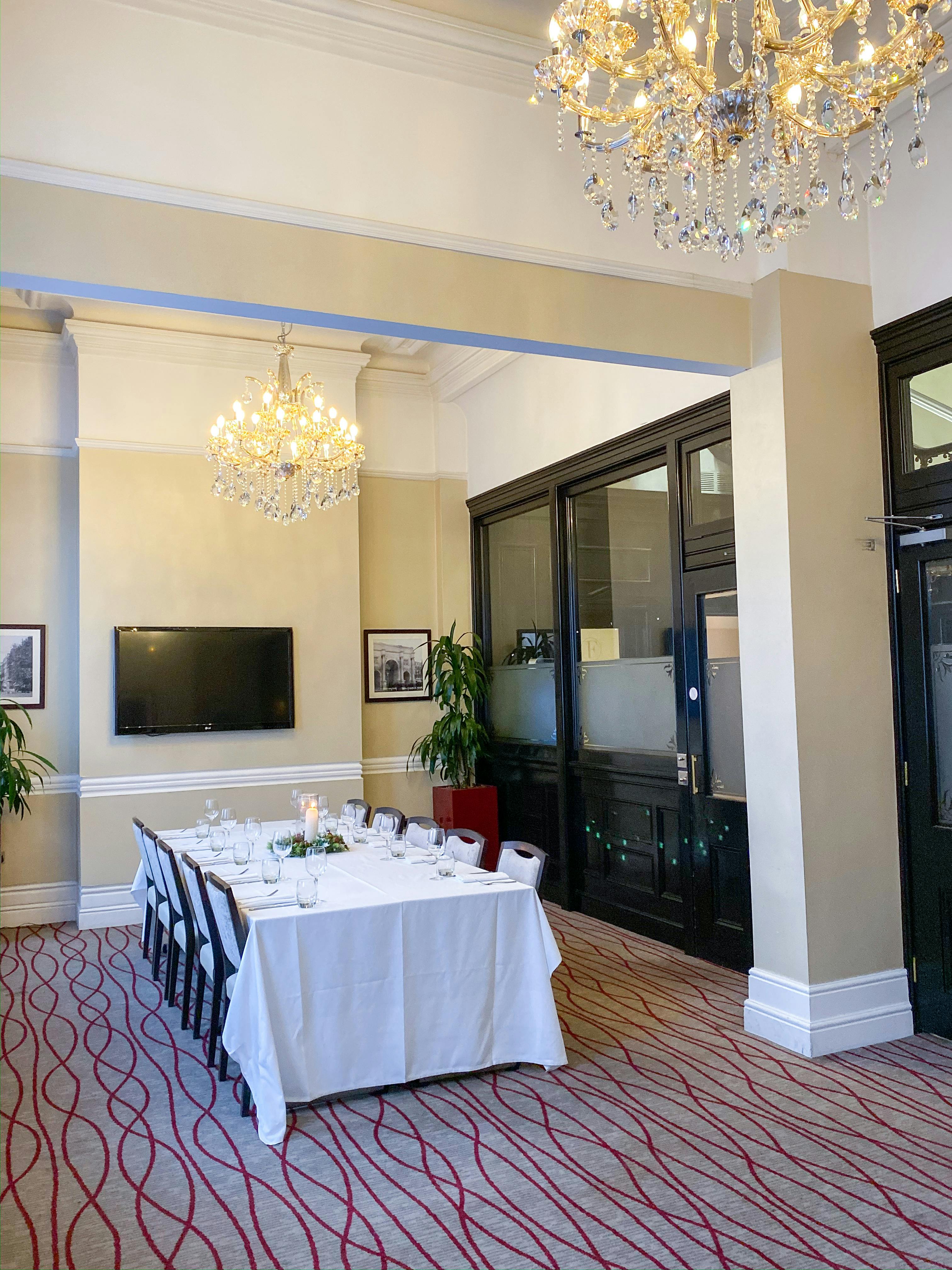 Worsely Room with chandelier, ideal for corporate events and intimate gatherings.