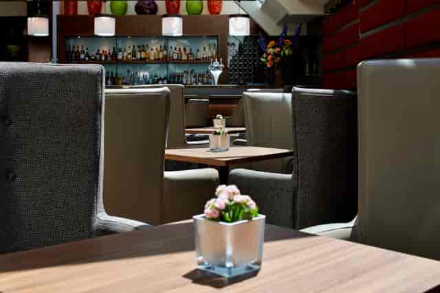 Modern restaurant interior at The Conservatory, perfect for networking events and meetings.