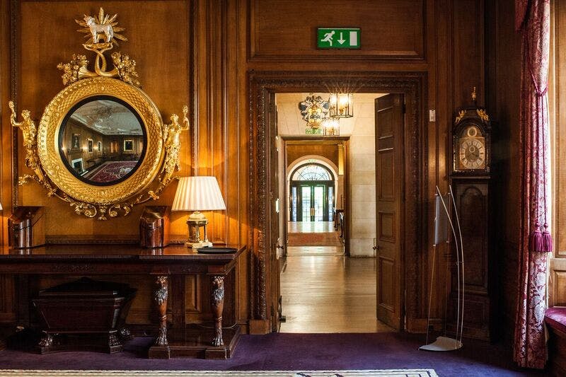 Elegant venue with wood paneling for high-end meetings and events at Merchant Taylors' Hall.