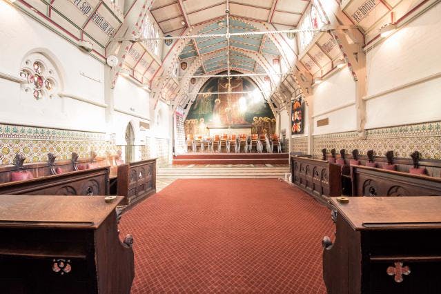 Elegant event space with ornate architecture, perfect for weddings and corporate meetings.