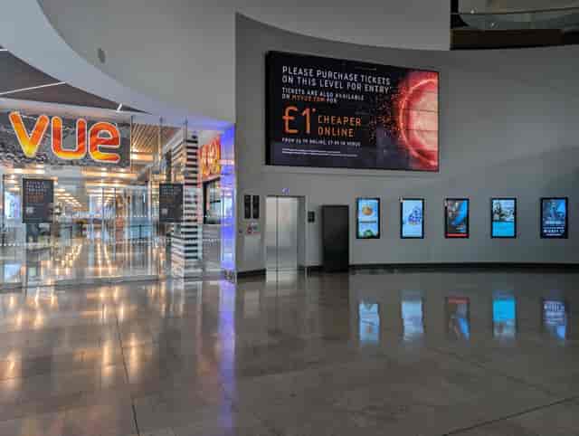 Digital signage in Vue Westfield Stratford City foyer for event wayfinding and registration.