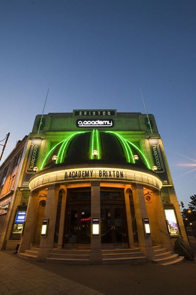 O2 Academy Brixton venue with neon facade, perfect for concerts and corporate events.