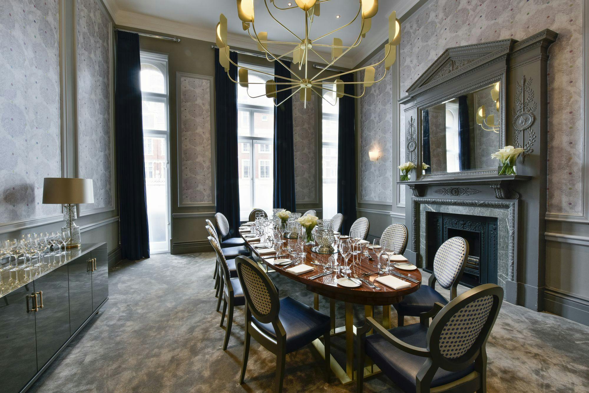 Elegant meeting space at Andaz London with polished table for corporate events.