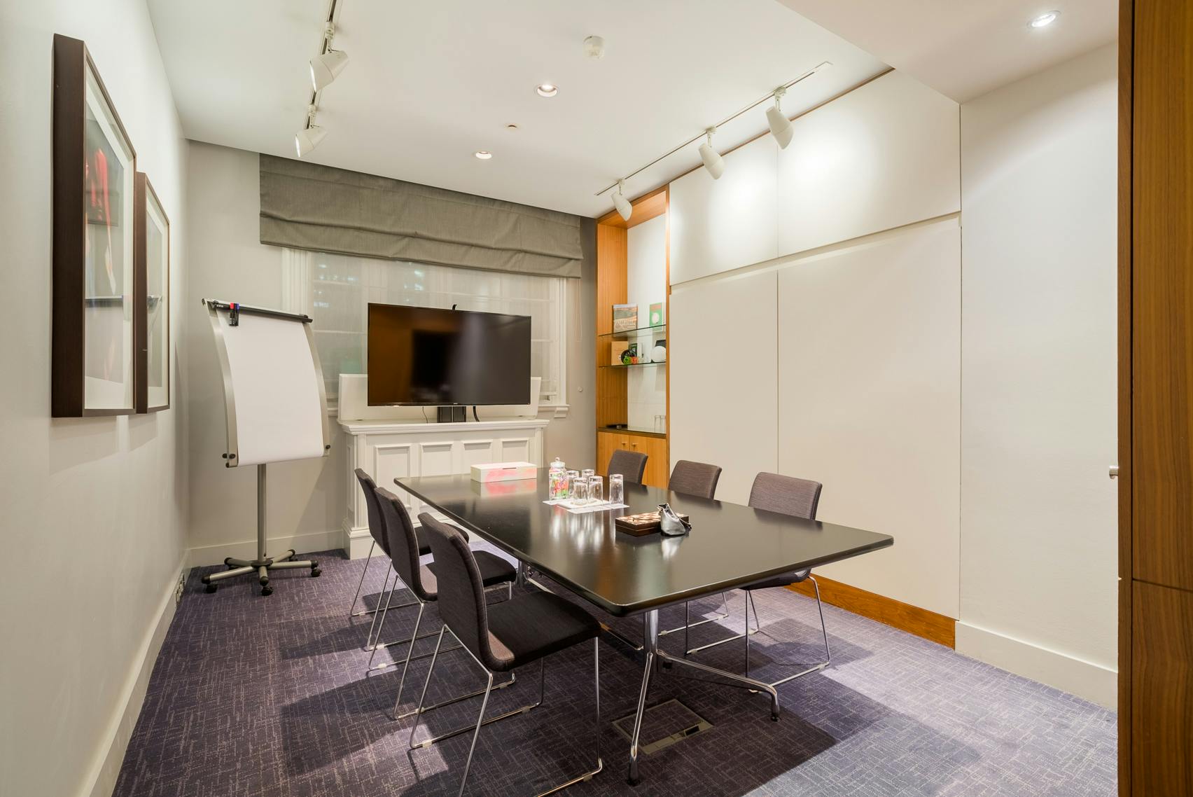 Leadenhall Suite meeting room with sleek table, ideal for workshops and presentations.