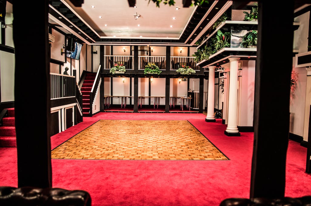 Hunt's Lounge event space with polished dance floor, ideal for weddings and conferences.