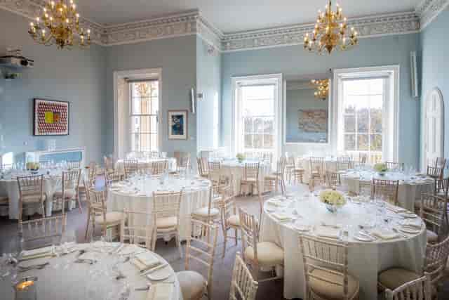 Beatrice Webb Room: elegant event space with round tables, ideal for corporate meetings and celebrations.