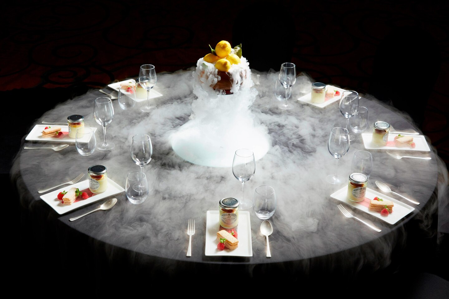 Elegant round table setup in Westminster Ballroom for upscale events at London Marriott. - Banner