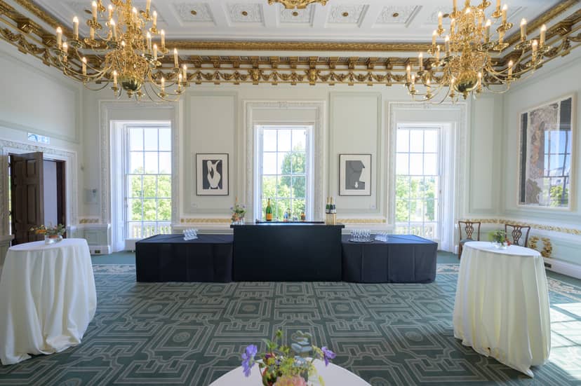 Radhakrishnan Room with chandeliers, ideal for upscale meetings and receptions.
