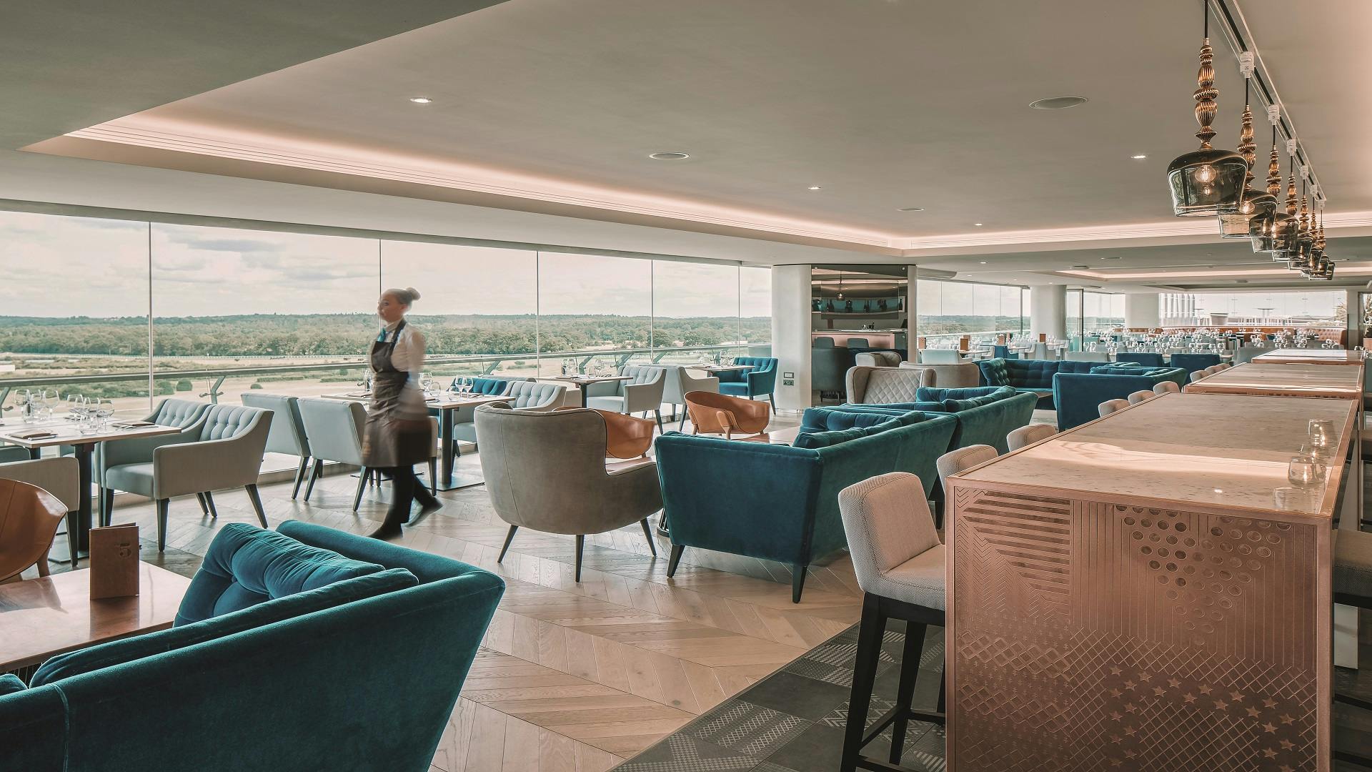 Modern event space at Ascot Racecourse with plush seating for corporate gatherings.