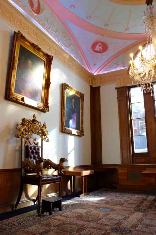 Elegant courtroom in Watermen's Hall with ornate decor, ideal for exclusive events.