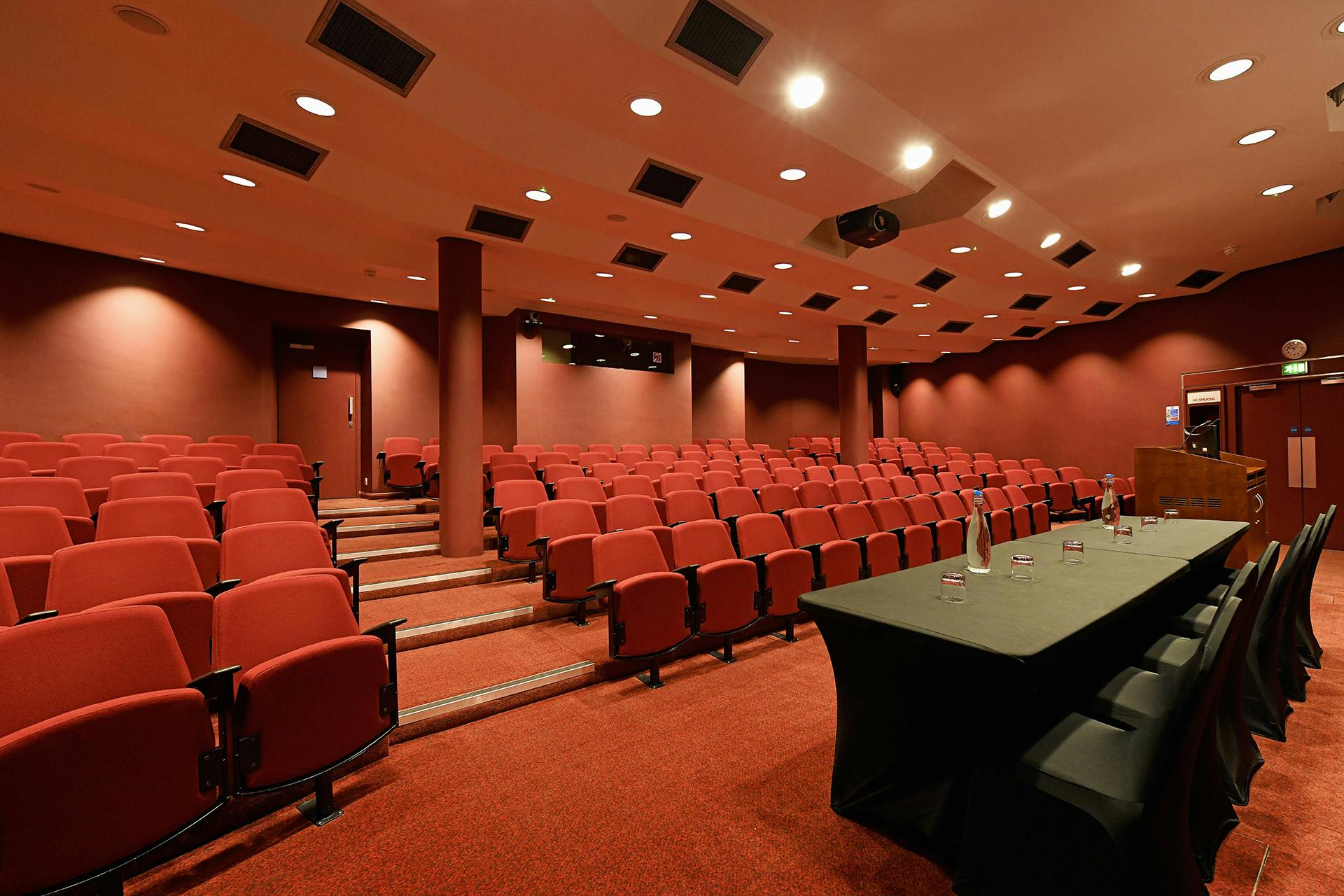 Auditorium in SCI Belgravia with tiered seating, perfect for conferences and seminars.