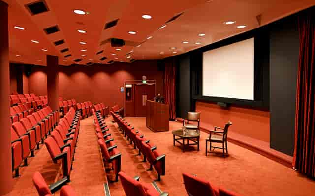 Auditorium in SCI Belgravia with tiered seating for presentations and conferences.