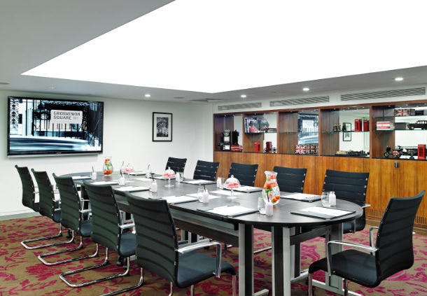 Modern Mayfair Suite meeting room with ergonomic chairs at London Marriott Hotel.