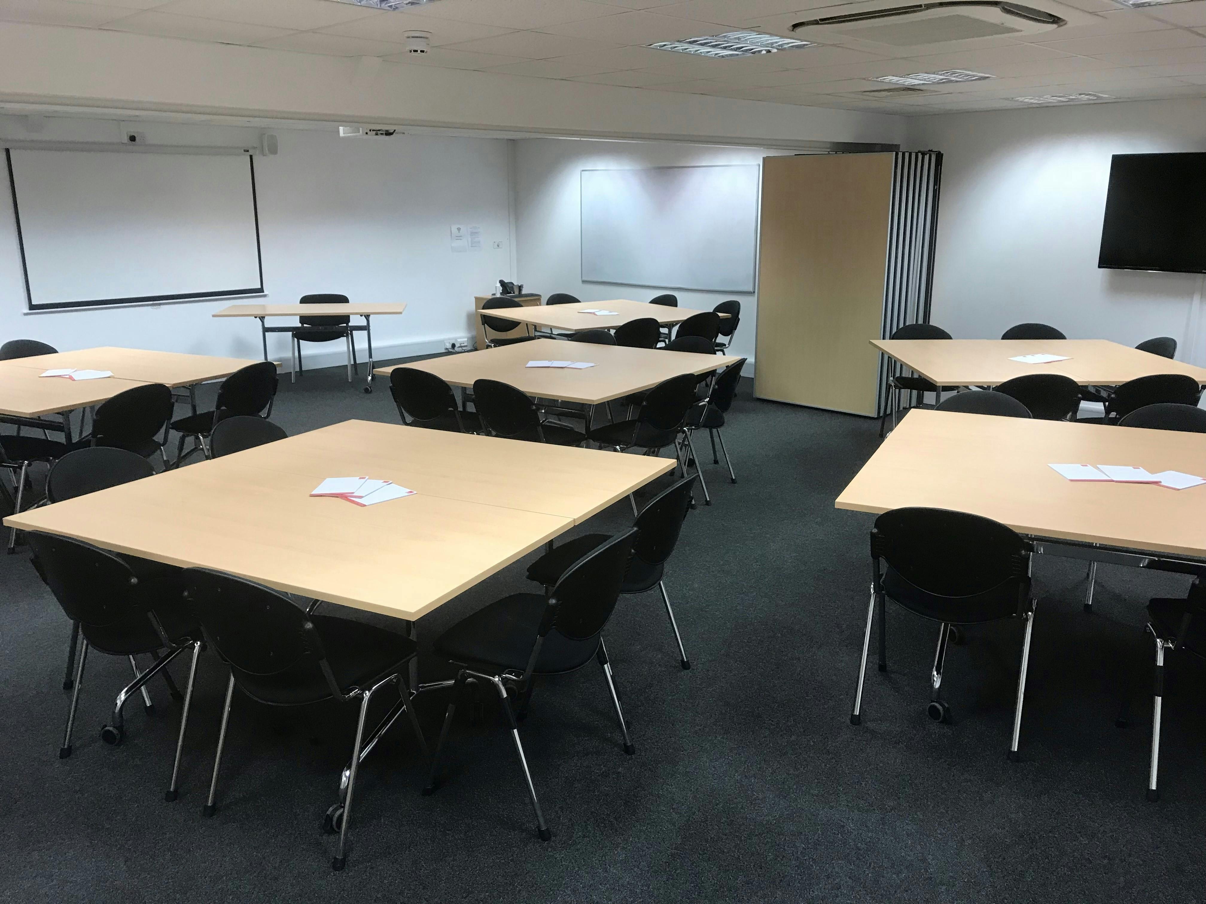 Conference Room at Pinnacle House, versatile layout for workshops and meetings.