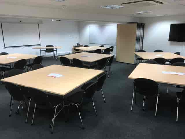Conference Room at Pinnacle House, versatile layout for workshops and meetings.