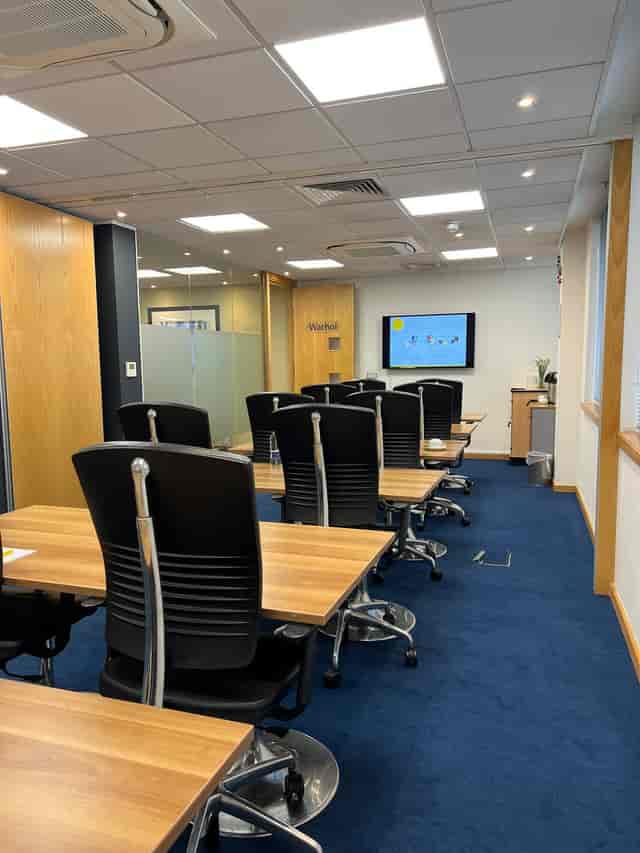 Dali Suite meeting room with ergonomic chairs, ideal for corporate training sessions.
