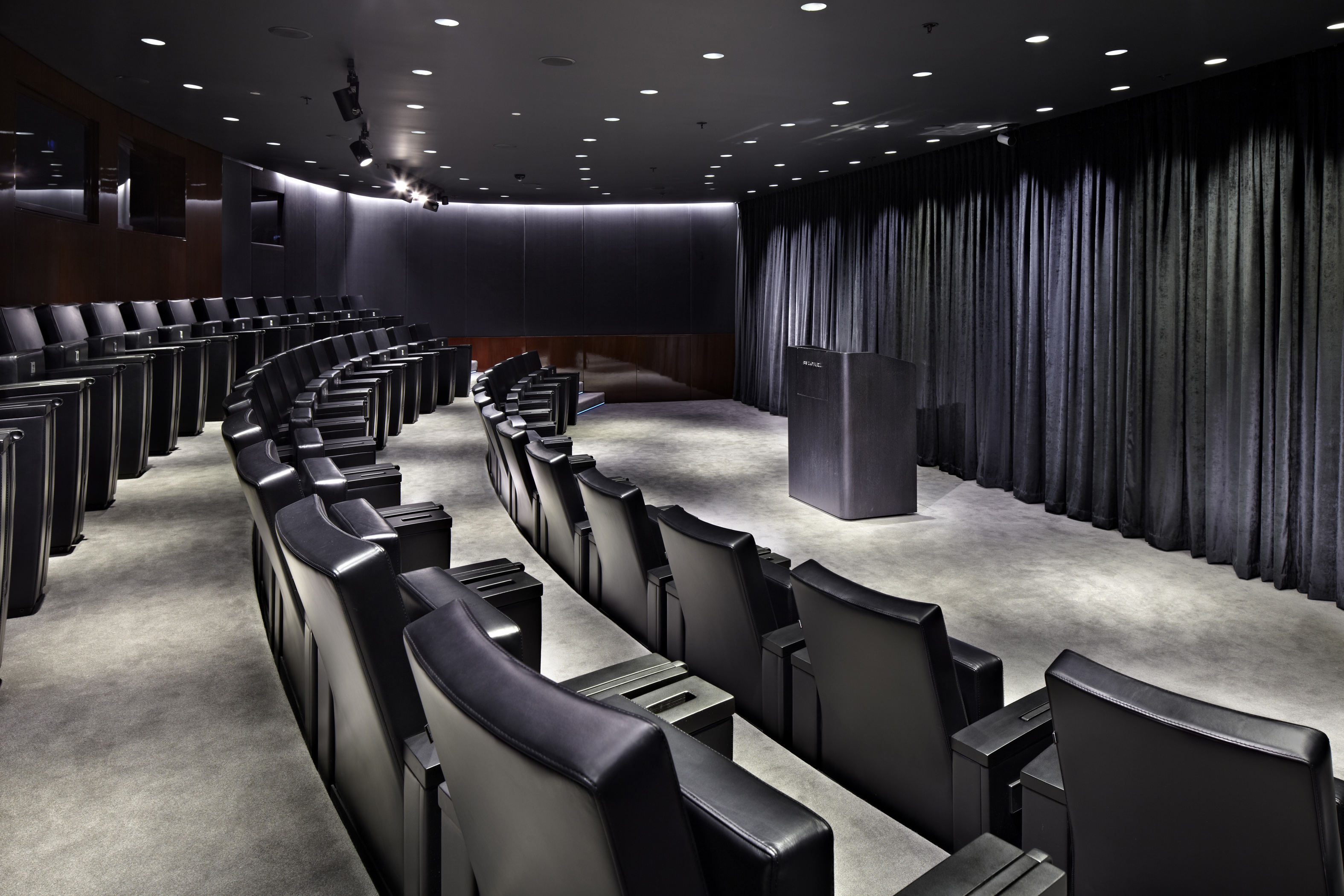 Modern auditorium at Bulgari Hotel, London for corporate events and presentations. - Banner