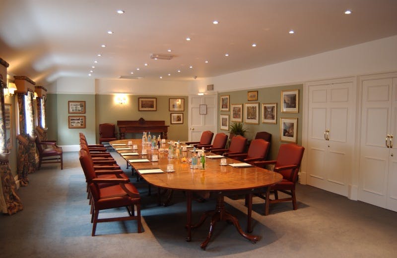 Castle Bromwich Executive Boardroom with polished table, ideal for corporate meetings and events.