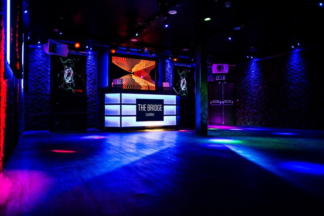 Vibrant event space at The Bridge London with dynamic lighting for nightlife gatherings.