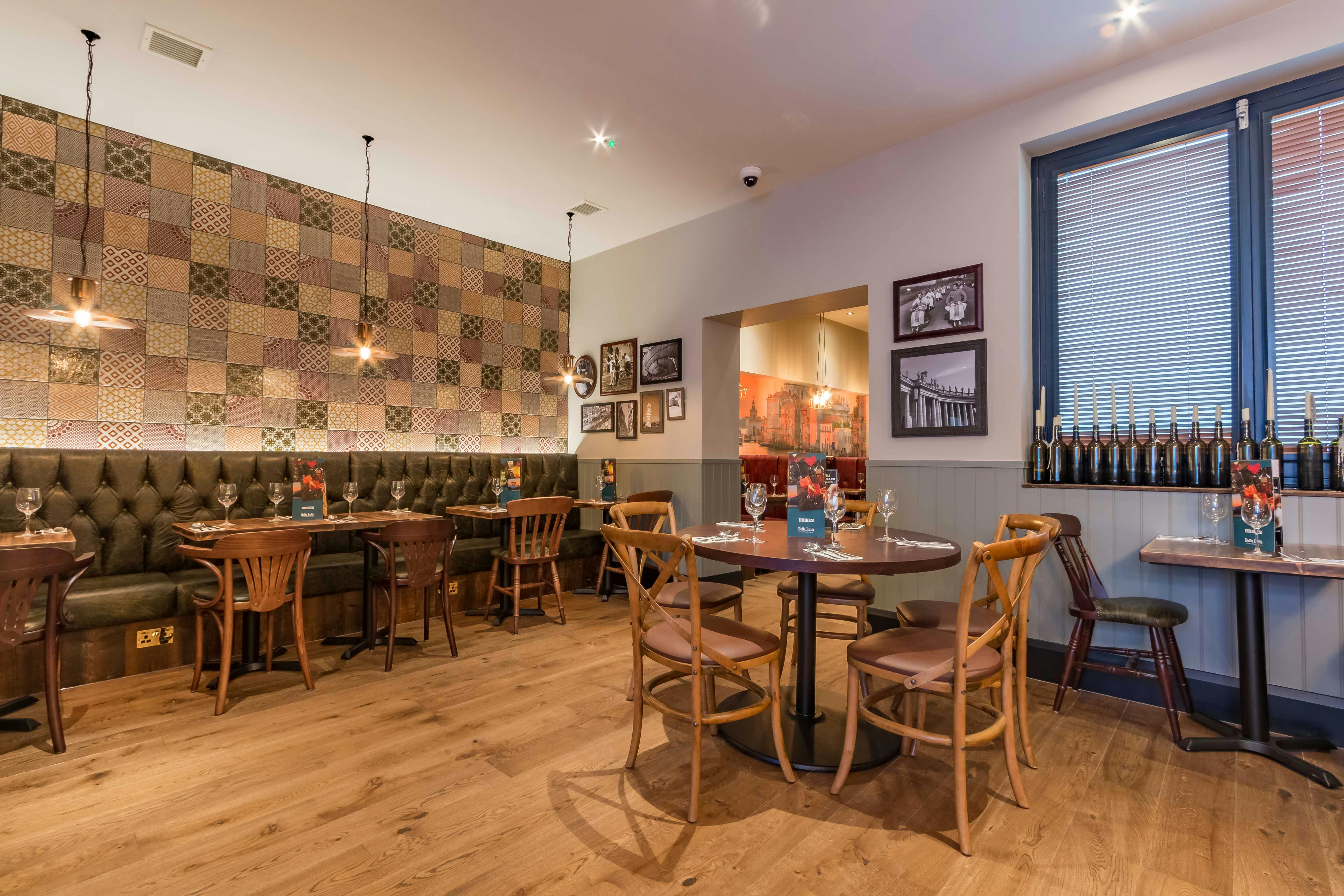 Stylish dining space in The Venice Room, perfect for intimate meetings and small events.