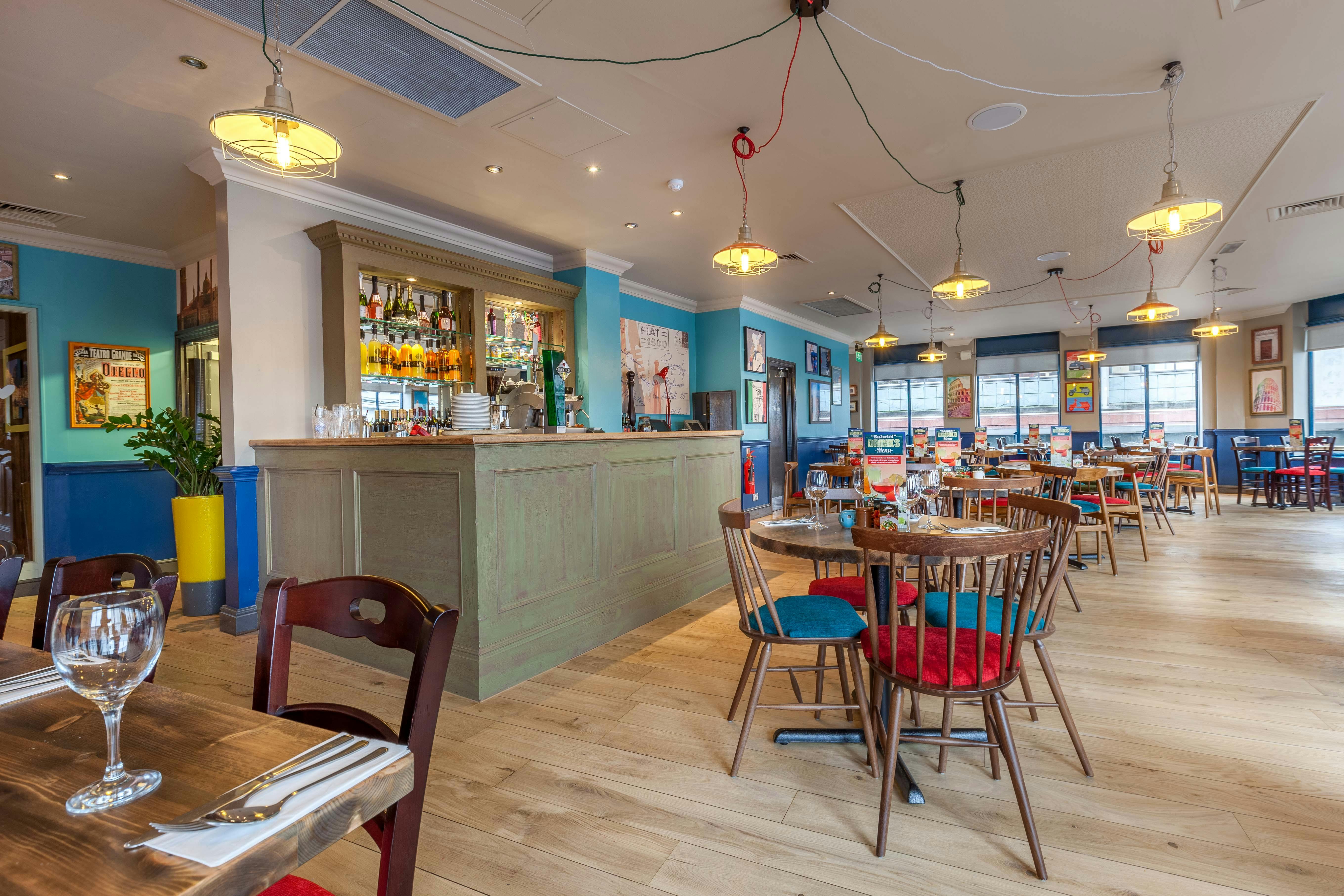 Vibrant Tuscany Room in Bella Italia Liverpool, perfect for casual meetings and events.