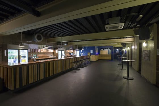 Spacious O2 Academy Liverpool venue with modern bar, ideal for receptions and gatherings.