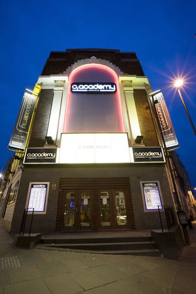 Vibrant O2 Academy Newcastle venue with illuminated signage for events and concerts.