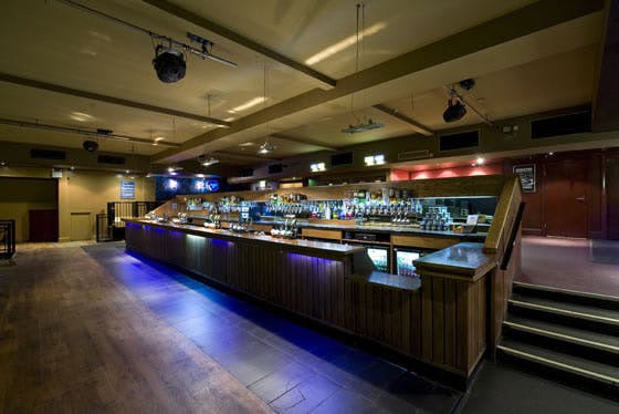 Spacious bar area at O2 Academy Newcastle, ideal for events and gatherings.