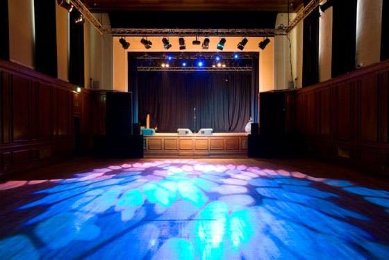 Versatile O2 Academy Leicester venue with stage and colorful lighting for events.