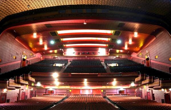 O2 Apollo Manchester theater with tiered seating, perfect for events and performances.