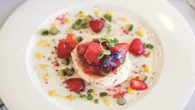 Elegant dessert with strawberries in The Furlong Suite, Ascot Racecourse event.