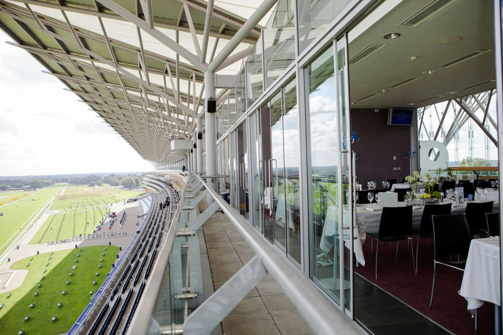 Panoramic Suite at Ascot Racecourse, modern event space with stunning views for corporate meetings.