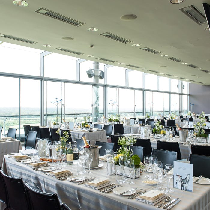 Panoramic Suite at Ascot Racecourse with elegant tables for corporate events and celebrations.